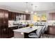 Well-designed kitchen featuring a center island, stainless steel appliances, and plenty of counter space at 2004 S Galapago St, Denver, CO 80223