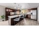 Modern kitchen with stainless steel appliances, a central island, and ample counter space for cooking at 2004 S Galapago St, Denver, CO 80223