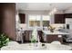 Well-equipped kitchen boasts modern appliances, granite countertops, and ample cabinet space at 2004 S Galapago St, Denver, CO 80223