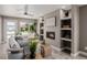 Comfortable living room boasting a cozy fireplace, stylish furnishings, and ample natural light perfect for relaxation at 2004 S Galapago St, Denver, CO 80223