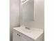 Clean bathroom with a modern vanity, sink, and ample lighting, great for guests at 8100 W Quincy Ave # 11, Denver, CO 80123