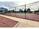 View of the tennis courts with the building in the background at 8100 W Quincy Ave # 11, Denver, CO 80123