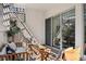Covered patio with cozy outdoor seating and lots of natural light coming in at 1223 Race St # 101, Denver, CO 80206