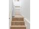 Laundry room featuring a washer, dryer, and built-in shelving for storage at 11647 E Wesley Ave, Aurora, CO 80014