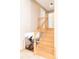 Staircase leading to the upper level, providing access to additional living space at 11647 E Wesley Ave, Aurora, CO 80014