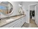 En suite bathroom with double vanity and walk-in shower at 3338 Youngheart Way, Castle Rock, CO 80109