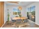 Bright dining room with a view and sliding glass doors at 3338 Youngheart Way, Castle Rock, CO 80109