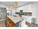 Modern kitchen with stainless steel appliances and an island at 3338 Youngheart Way, Castle Rock, CO 80109