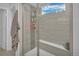 Modern shower with built-in seat and glass enclosure at 3338 Youngheart Way, Castle Rock, CO 80109