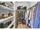 Spacious walk-in closet with ample shelving and hanging space at 3338 Youngheart Way, Castle Rock, CO 80109