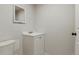 Half bathroom with white vanity at 3559 Hudson St, Denver, CO 80207