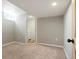 Bedroom featuring neutral paint, carpet and walk-in closet at 3559 Hudson St, Denver, CO 80207