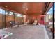 Stylish covered outdoor patio with seating and stone pavers at 3559 Hudson St, Denver, CO 80207
