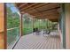 Unwind on this spacious wooden deck, featuring stylish seating and scenic views of the surrounding landscape at 20033 Silver Ranch Rd, Conifer, CO 80433