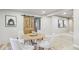 Contemporary dining area featuring a stylish barn door and modern decor at 20033 Silver Ranch Rd, Conifer, CO 80433