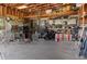 Spacious garage interior featuring ample storage with tools and equipment at 20033 Silver Ranch Rd, Conifer, CO 80433
