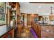 Spacious kitchen featuring sleek countertops, custom cabinetry, and modern appliances, all illuminated by ample natural light at 20033 Silver Ranch Rd, Conifer, CO 80433