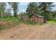 Exterior view of two sheds for storing equipment and outdoor essentials at 20033 Silver Ranch Rd, Conifer, CO 80433