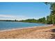 Beautiful sandy beach by the lake, providing an ideal spot for swimming, sunbathing, and recreational activities at 2748 S Kenton Ct, Aurora, CO 80014