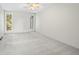 Spacious bedroom featuring neutral carpet, two windows, and plenty of natural light at 2748 S Kenton Ct, Aurora, CO 80014