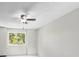 Bedroom featuring a ceiling fan, and a window that brings in natural light at 2748 S Kenton Ct, Aurora, CO 80014