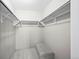 Walk-in closet with built-in shelving and bench at 2748 S Kenton Ct, Aurora, CO 80014