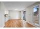 Cozy dining area with hardwood floors and a sliding glass door to the backyard at 2748 S Kenton Ct, Aurora, CO 80014