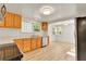 Bright kitchen featuring stainless steel appliances and a view into the dining area at 1930 Hoyt St, Lakewood, CO 80215