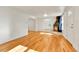 Open living room with hardwood floors and fireplace, perfect for entertaining at 1930 Hoyt St, Lakewood, CO 80215
