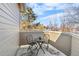 Cozy patio features an outdoor seating area and a view of the community trees at 6001 S Yosemite St # H204, Greenwood Village, CO 80111