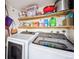 Modern laundry room equipped with newer model Samsung washer and dryer at 2567 Rainbow Dr # 80, Denver, CO 80229