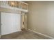 Bedroom has a loft and closet with multiple doors at 6490 S Dayton St # L10, Englewood, CO 80111