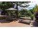 Outdoor picnic area with multiple tables, and shade trees, perfect for enjoying meals and gatherings at 6490 S Dayton St # L10, Englewood, CO 80111