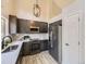 Modern kitchen features stainless steel appliances, countertops, and ample cabinet space at 4287 Brookwood Pl, Highlands Ranch, CO 80130