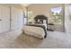 Serene main bedroom with a vaulted ceiling, plush carpet, two windows, and ample closet space, creating a peaceful retreat at 4287 Brookwood Pl, Highlands Ranch, CO 80130