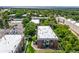 Scenic aerial view showcasing apartment buildings with well-maintained landscaping and ample parking at 5995 W Hampden Ave # 20B, Denver, CO 80227