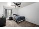 Cozy bedroom with a ceiling fan and natural light at 5995 W Hampden Ave # 20B, Denver, CO 80227