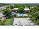Aerial of community amenities, including a basketball court, pool, and well-maintained apartment buildings at 5995 W Hampden Ave # 20B, Denver, CO 80227