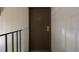 An apartment front door on a plain white wall at 5995 W Hampden Ave # 20B, Denver, CO 80227