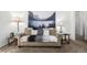 Comfortable living room with a couch and decorative pillows and tapestries at 5995 W Hampden Ave # 20B, Denver, CO 80227