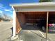 Assigned covered parking carport with vehicle parked inside at 2441 S Xanadu Way # A, Aurora, CO 80014