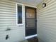 Close-up of front door and window, showcasing the home's welcoming entrance at 2441 S Xanadu Way # A, Aurora, CO 80014