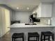 Beautiful kitchen with countertop seating and an undermount sink at 2441 S Xanadu Way # A, Aurora, CO 80014