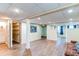 Open basement featuring a kitchenette, storage and finished area perfect for entertaining at 13871 Ivy St, Thornton, CO 80602