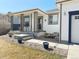 Cozy house with stone landscaping, nice entryway, a cute porch and an attached 2 car garage at 13871 Ivy St, Thornton, CO 80602