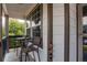 Charming front porch features outdoor seating and a view of the neighborhood at 13871 Ivy St, Thornton, CO 80602