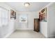 Bright bedroom featuring fresh paint and carpet with a sunny window and painting at 741 Quitman St, Denver, CO 80204