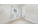 Bright bedroom featuring fresh paint and carpet with a sunny window at 741 Quitman St, Denver, CO 80204