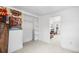 Bright bedroom featuring fresh paint and carpet with a painting, wardrobe and closet at 741 Quitman St, Denver, CO 80204
