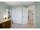 Spacious bedroom with closet, desk, and open doorway to hallway at 486 Balsa Dr, Castle Rock, CO 80104